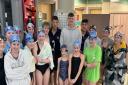 Ollie Morgan with children at the swimming club