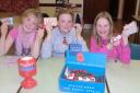 Joining in with the Poppy Appeal bingo are, left to right, Isis Coleman, Rhiannon Coleman and Elisa Kinsey.