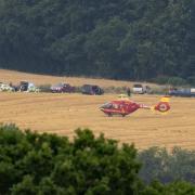 An air ambulance landed on a field between Mortimer's Cross and Shobdon
