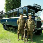 Pte Mike Gould and Pte Rod Henley with a Lee Enfield rifle alongside a 1925 AEC Model 411. Photos: Keith Gluyas.