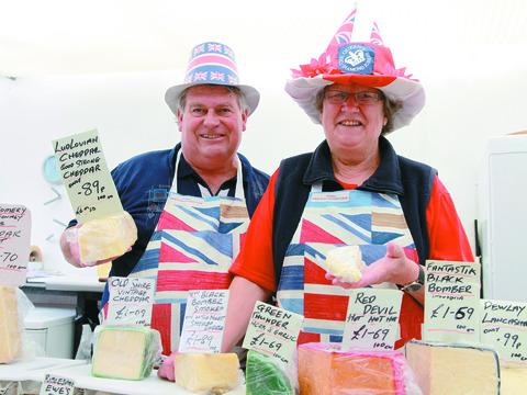 Mark and Bella Woodward with their cheese stall at Ludlow Jubilee Market.