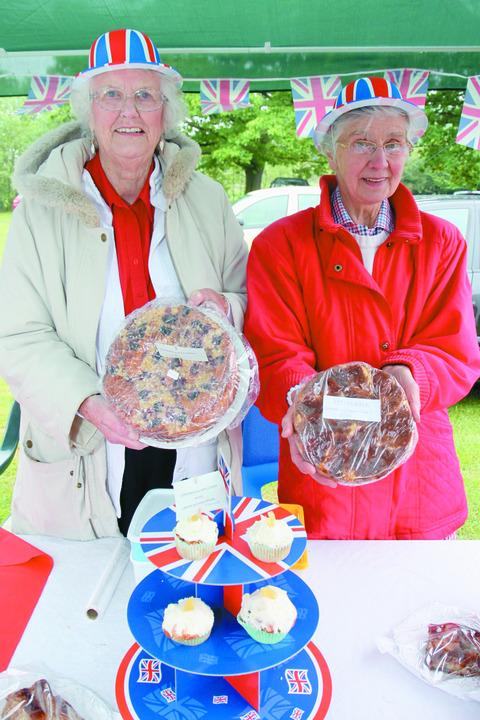 Primrose Simpson and Primrose Wallace look after St Mary's Church cake stall.