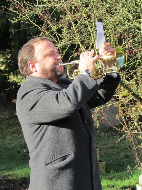 Paul Kemp plays the Last Post at the remembrance service held at St Leonard's Churchyard.