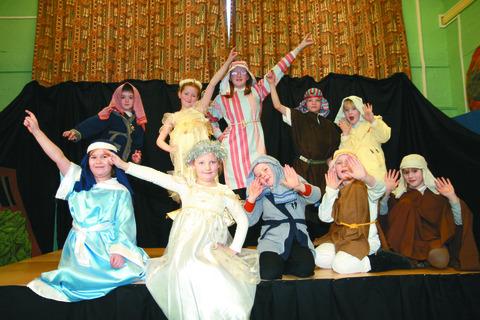 Above: Lindridge CE
Primary, cast of The
Shepherd’s Tale.
125052-1
Rear, standing:
Toby Barton, Jessica and
Charlotte Harris, Adam
Wilson (Joseph) and
Megan Farmer; Front,
sitting:
Tegan Lewis (Mary),
Harriet Wallace, Huey
Barton, Cerys Read