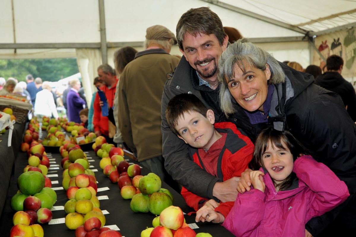 Jamie and Elly McDonald with eight-year-old son Archie and six-year-old daughter Louisa who were admiring the apple display 