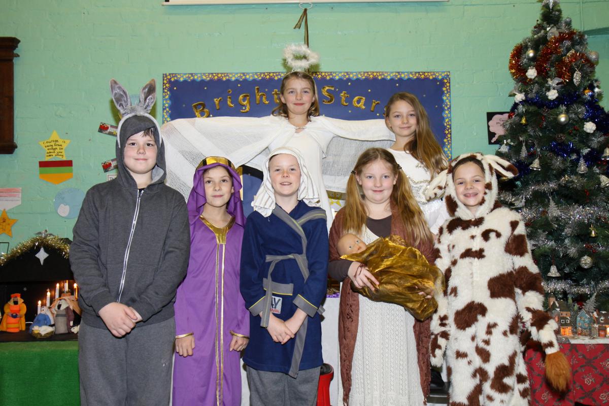 At Lindridge St Lawrence CE Primary School, KS2 pupils staged Hosannah Rock. Rear: Cerys Arnold and Ruby Gumbley (Angel narrators); front: Euan Vaughan (donkey),Lauren Adams (King), Huey Barton (Joseph), Harriet Wallace (Mary) and Lara Starkey (Cow)