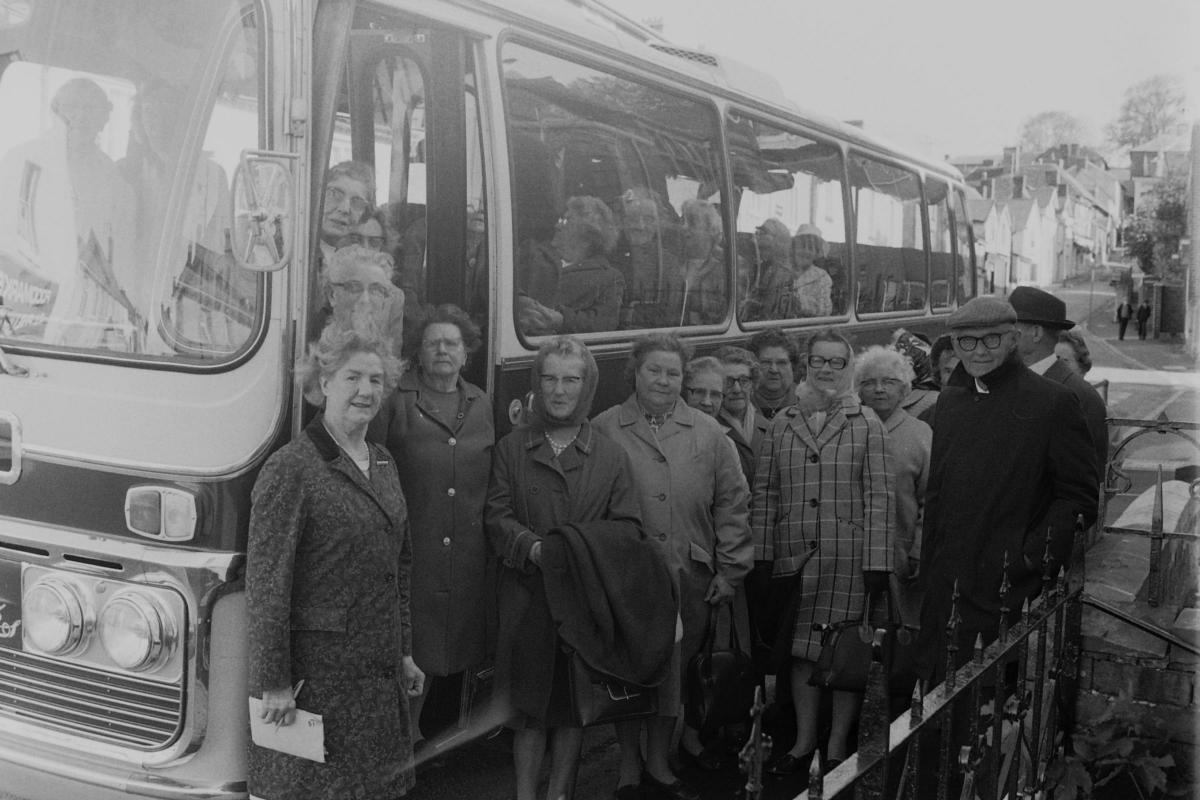 A group of Bishop's Castle folks heading off on a coach trip in the late 1960s. From the Colin Love collection.