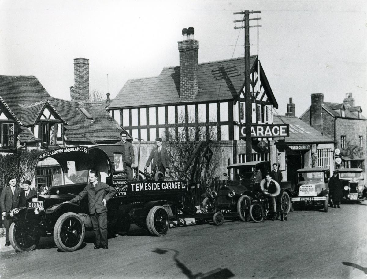 Temeside Garage in Ludlow - taken about 1930. The garage buildings were demolished to make way for a newer Temeside Garage which was set further back from the road. That is also no more.
