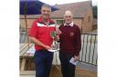 Steve Wallbank (left) receiving the Herefordshire County Seniors Trophy from Doug Parry, President of the Shropshire and Herefordshire Union of Golf Clubs.