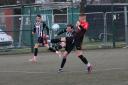 Josh Williams makes a tackle during Ludlow Colts' 2-1 defeat against Ledbury Town, Picture: Graham Gould