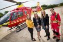Michelle McCraken (left) who is the individual giving and development manager with the Midlands Air Ambulance Charity and  critical care paramedic Kerry Heums (right) together with representatives from FBC Manby Bowdler LLP