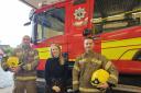 Vicki Dean with firefighters Prouse and Wright