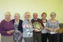 The winning members of 'the Waistliners' are (from left): Ann Croxton, Ruby Staples, presenter Pam Bunn, Keith Croxton, Maureen Robinson and Pam Wright.