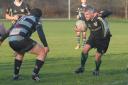 Tenbury's Pete Stephens attacks during the match against Redditch.