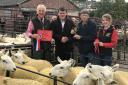 From left: Glyn Owens, McCartneys – Auctioneer, Ed Jones, Heartsease – Judge, Philip and Elizabeth Swancott of T A Swancott & Son – Champion Pen of Lambs