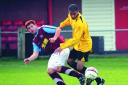 Town’s Nathan Hodge (right) tangles with a Hodnet player. Photo: NIGEL BISHOP 114480-012