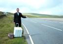 Getting the cold shoulder on the hard shoulder? Tony Hawks hitches with a fridge.