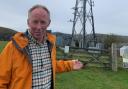Lib Dem MP candidate Chris Naylor with the Hazler Hill mast