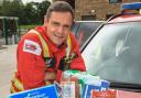 Critical care paramedic, Stephen Mason, with just some of the kit that these scheme will be raising funds for.
