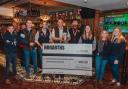Hogarths presented a £1,000 cheque