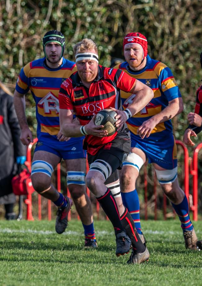 Ludlow Skipper and man of the match Matt Davies breaks away from a line out intercept en route to his side’s first try against Old Halesonians. Picture: Trevor Patchett