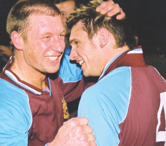 Champagne corks flew in May 2004 when Malvern Town Football Club clinched its first league title for almost 50years. Pictured are Des Cox and Andy Chalmers