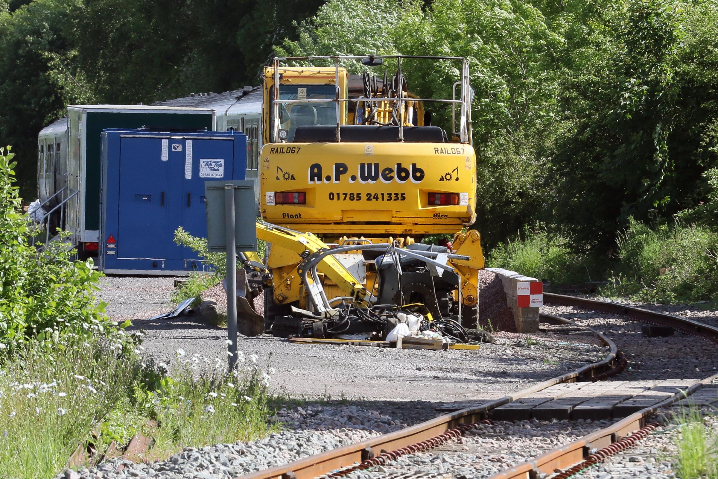 The wreckage of the mini digger near the Long Lane level crossing in Craven Arms. Picture: Rob Davies
