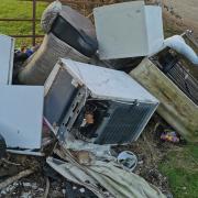 The fly tipping has not been moved from the Knighton property in two years.