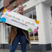 Hope House children's hospice Ludlow shop manager Emma Gibson outside the new shop before it opened
