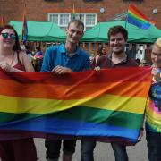 Nicola Paton, James Parry, Mikey Evans and Jo Swinbourne were Flying the flag at a previous Pride event in Ludlow