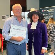 Healthwatch Hero George Rook receives his award from Shropshire high sheriff Mandy Thorn