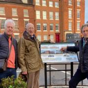 Mark Ansell of Blast Design, Ian Bott and John Cartwright (both of Ludlow Civic Society) with the new information board in Ludlow