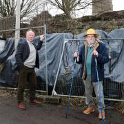 Chris Naylor, the Liberal Democrat parliamentary candidate for South Shropshire (left) and Councillor Andy Boddington next to the collapsed wall