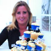 Amie Horsfall with cakes made using Kudos Blends ingredients.