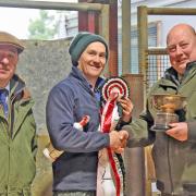 L to R auctioneer James Evans with the Bowen family of Penthryn, February 29